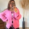 Pull grosse maille rose a lacets à nouer
