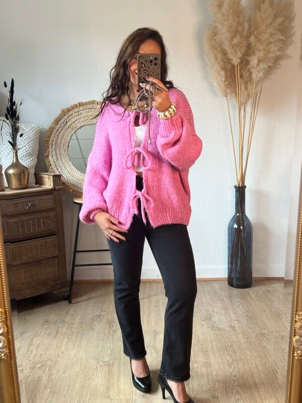 Pull grosse maille rose a lacets à nouer