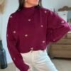 Pull bordeaux à cœurs métalliques– Modèle